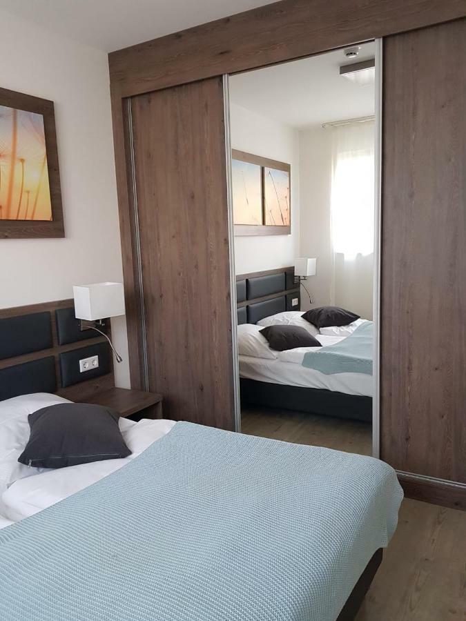 Prima Inn Ferienwohnungen Seetor Residenz นอยรุพพิน ภายนอก รูปภาพ